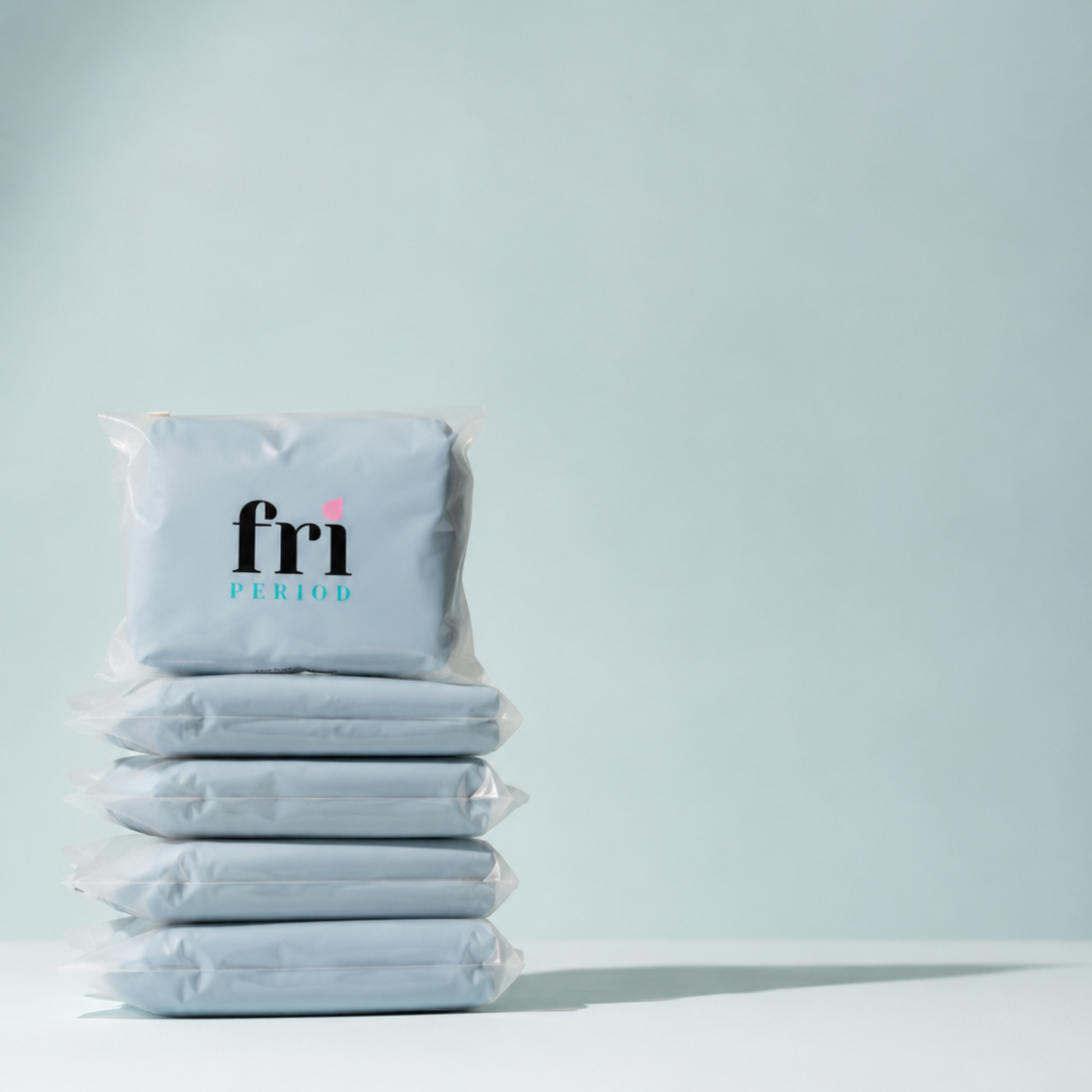 A stack of Fri Period non toxic period underwear against a plain blue background