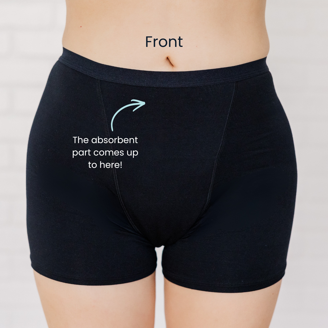 Black absorbent briefs worn by a person on a plain background