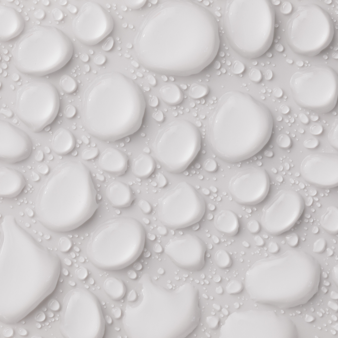 Water droplets on a white background
